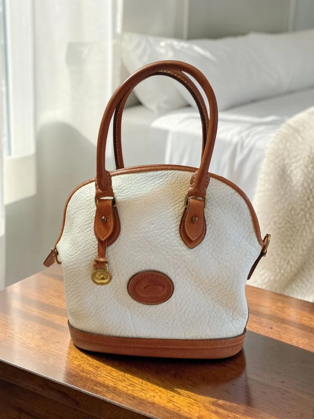Dooney & Bourke White Pebbled Leather Satchel with Brown Trim